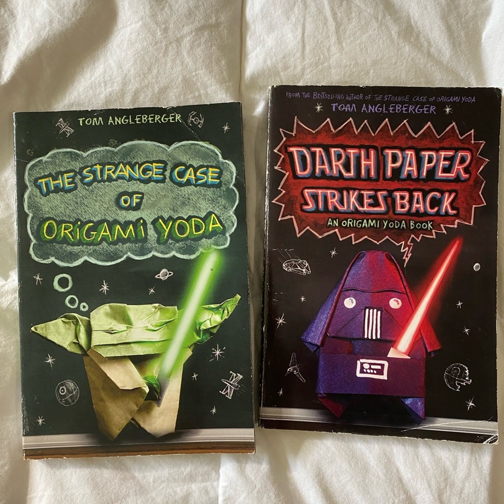 2 assorted books by Tom Angleberger